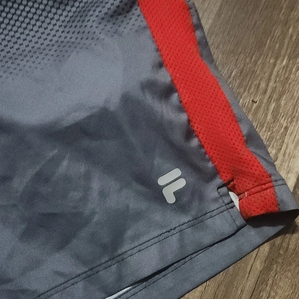 FILA  Swimtrunks Size Small Black and Red color EUC